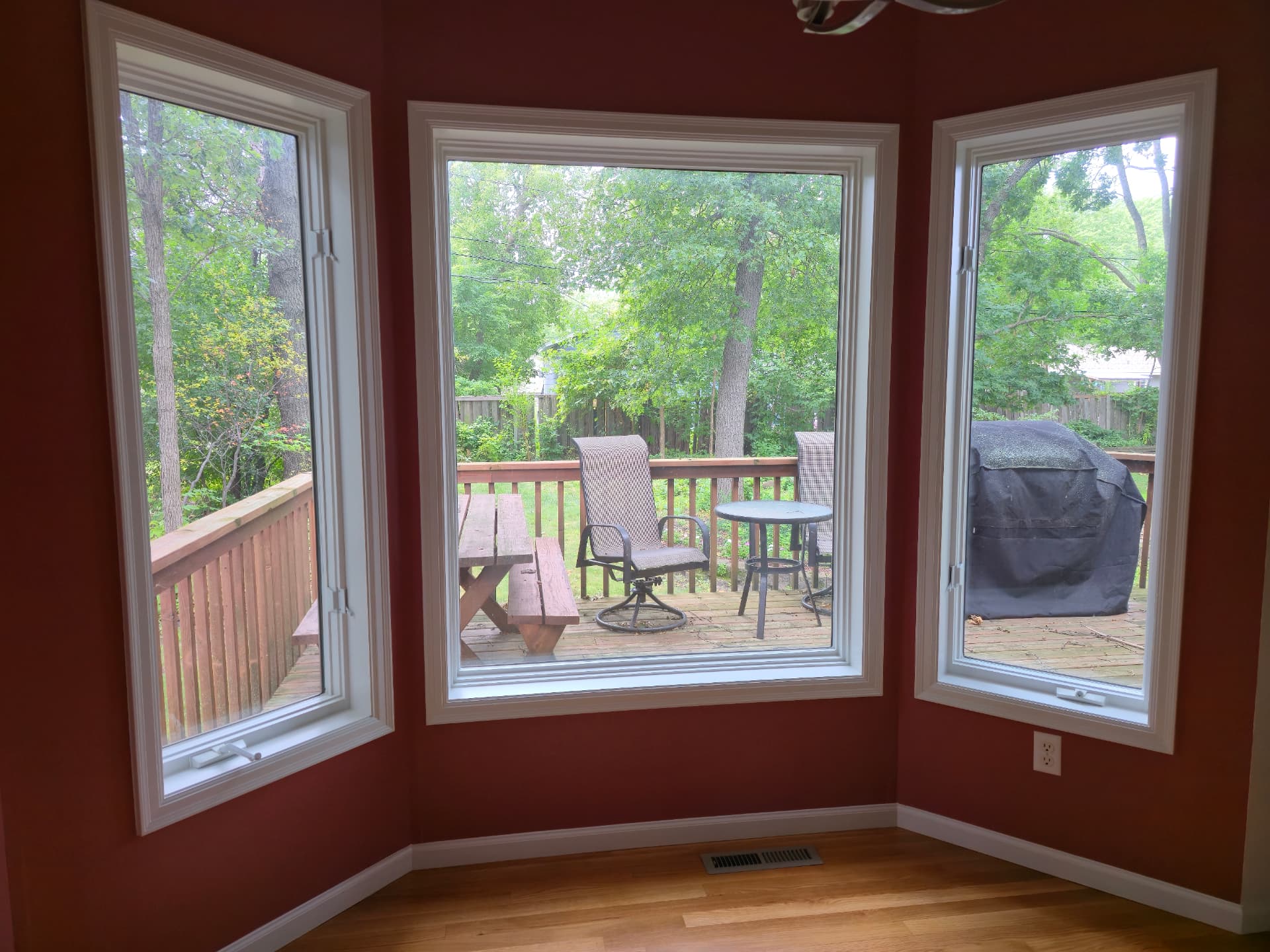 Bay Window Room with Red Accent Walls Painting in Shoreview, MN