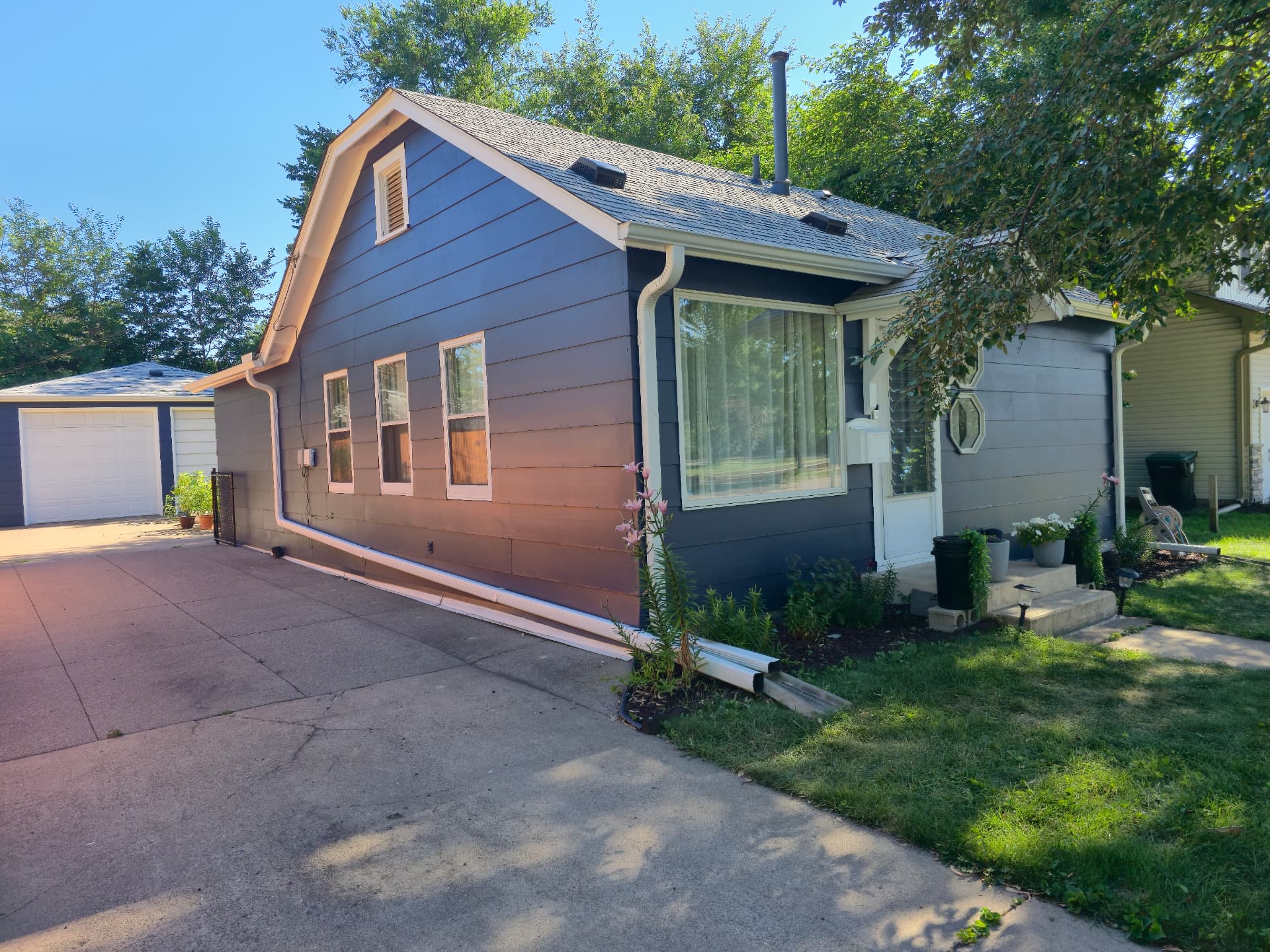 Two-Tone Blue and Gray Siding Exterior Painting in Vadnais Heights, MN