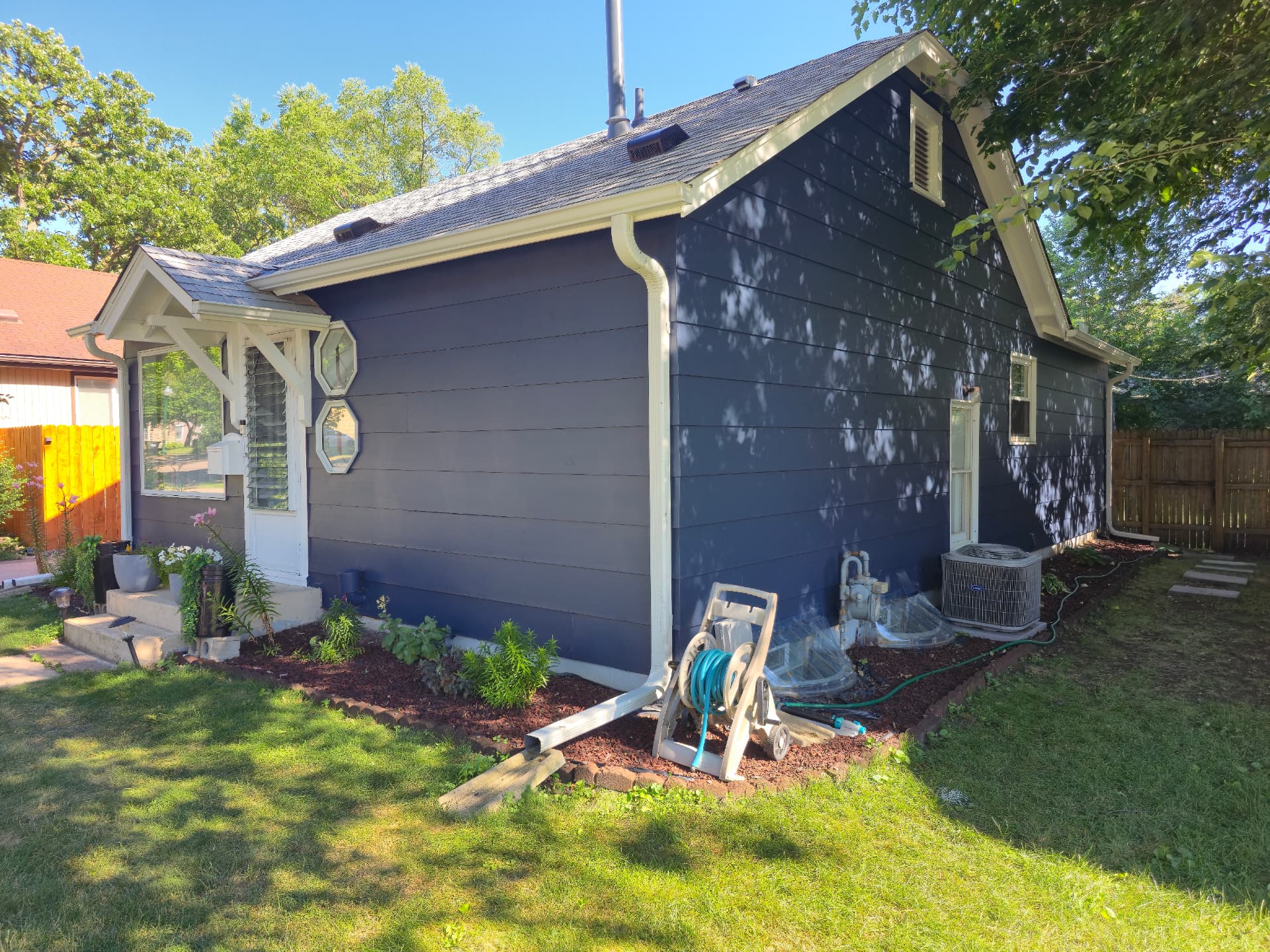 Navy Siding Exterior Painting with White Trim in White Bear Lake, MN