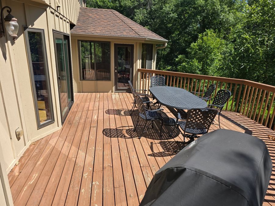 Weathered deck before staining with worn finish