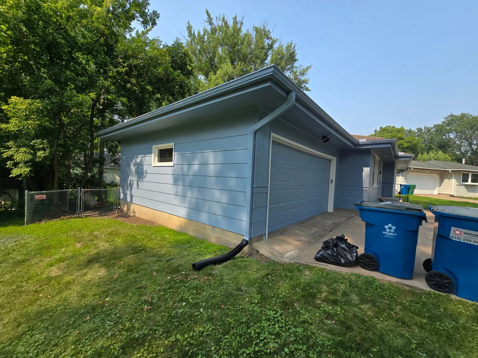 Detached Blue Garage with White Trim · New Brighton, MN · Detached garage exterior, color coordination Detached Blue Garage Painting in New Brighton, MN