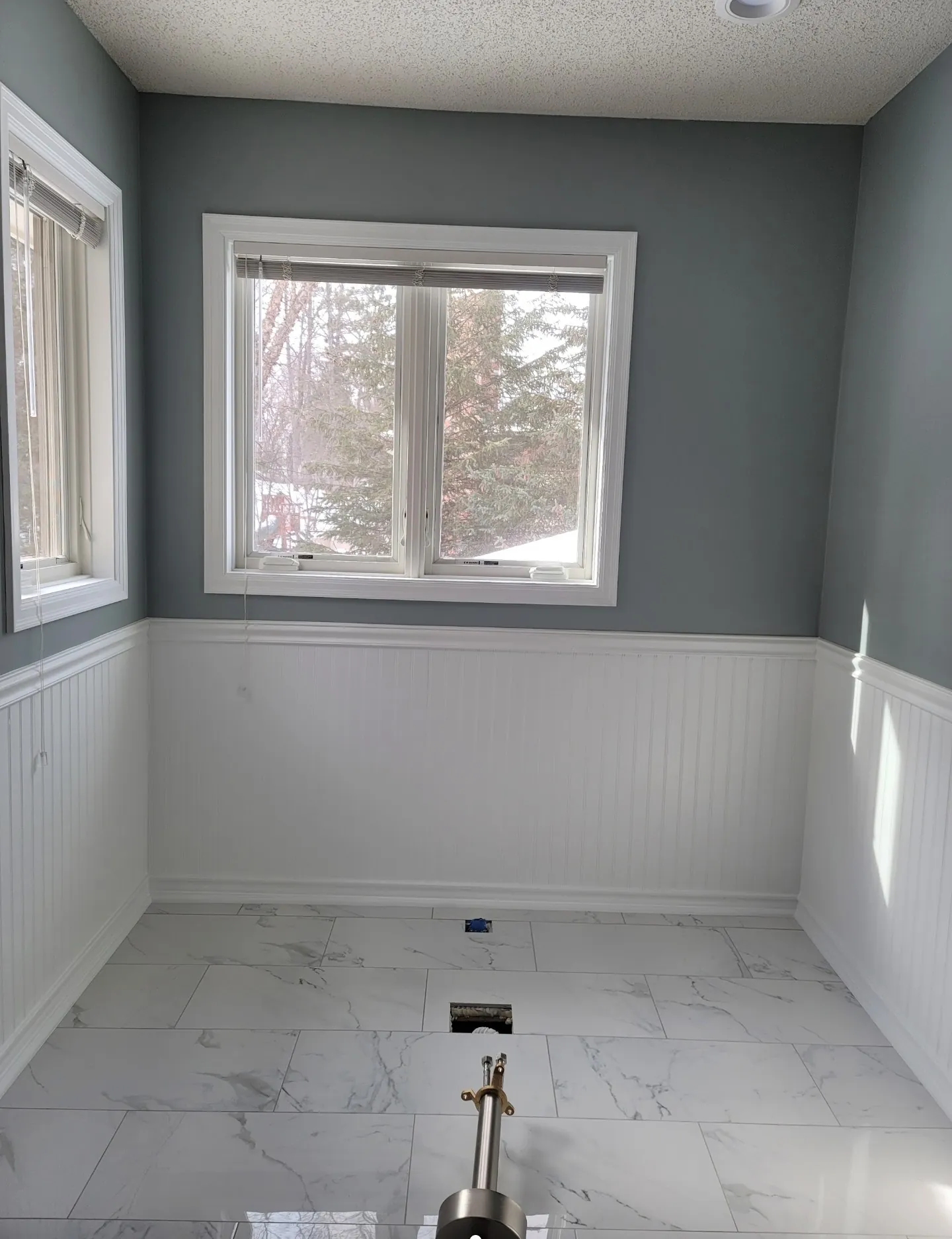 White Beadboard Bathroom with Marble Flooring · Arden Hills, MN · Beadboard painting, upper walls, floor protection White Beadboard Bathroom Painting in Arden Hills, MN