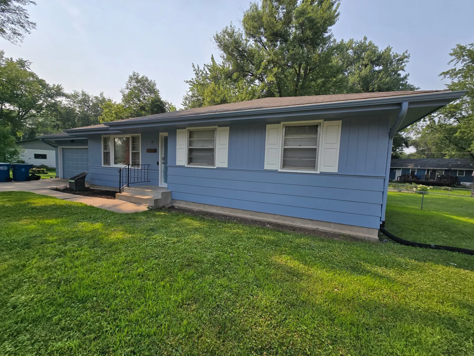 Blue Ranch Home Exterior Paint · Hugo, MN · Full siding, color consultation, trim Blue Ranch Home Exterior Painting in Hugo, MN