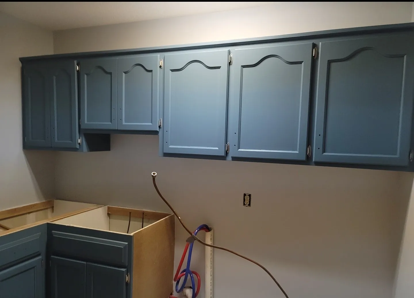 Professional cabinet painting work by Advanced Painting Services